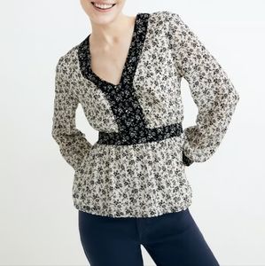 Madewell V-neck peplum black and white long sleeves top.
